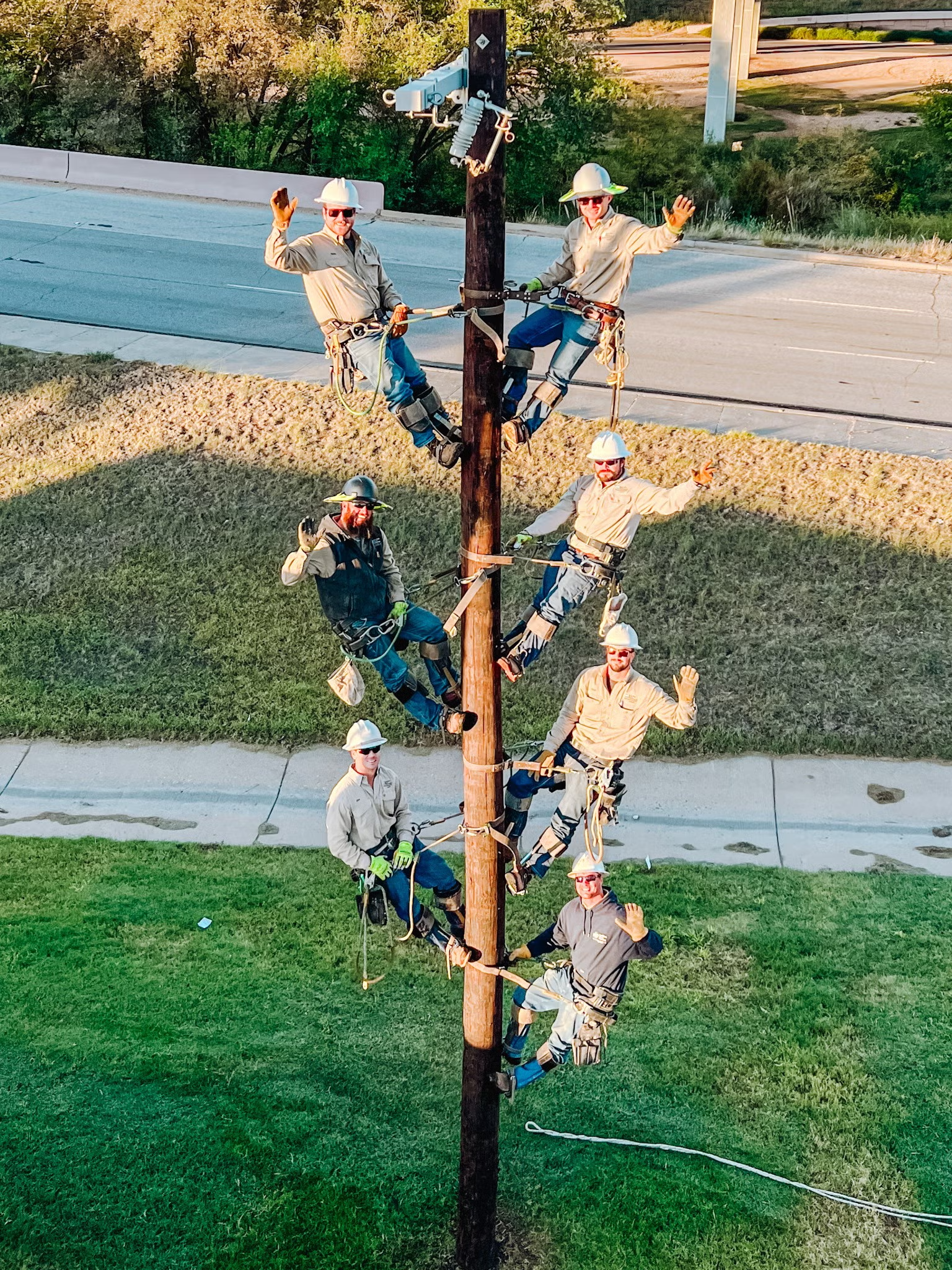 linemen on pole
